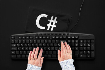 C# programming language. Rag width word c sharp and pc keyboard.