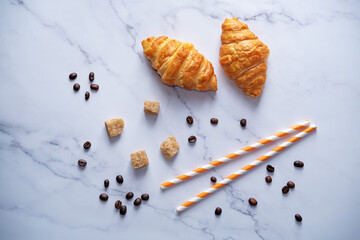 Coffee with whipped cream in a glass with coffee beans