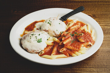 Chicken Parmesan with penne pasta