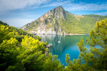 Dam lake in Green Canyon. Beatiful View to Taurus Mountains and turquoise water. Coniferous forest...