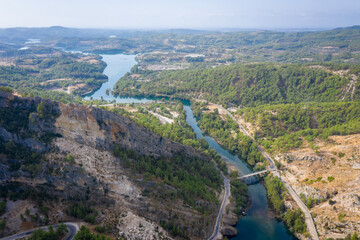 Fototapeta premium Mountain Lake. view of the valley from the side of the dam Oymapinar. Green Canyon, Turkey, Managvat