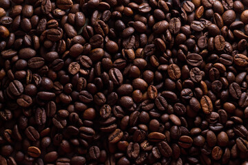 Background of coffee beans. brown food background. medium roasted grains