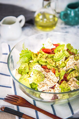 Salad with avocado, cucumber, cherry tomatoes and lettuce. Symbolic image. Concept for healthy nutrition. Close up