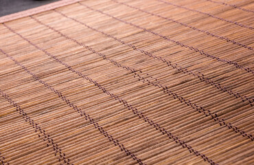 brown bamboo Mat - stand food, close-up, macro
