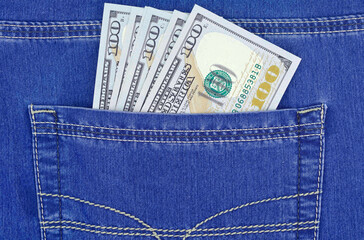 dollar bills in jeans pocket close-up