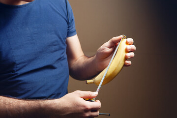 banana with measurement tape men penis size concept
