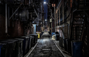Naklejka na ściany i meble Dark abandoned alley at night