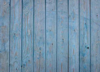 background from a board with shabby blue paint. close-up.