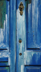 an old wooden painted blue and light blue in the old town of Funchal, Madeira, Portugal