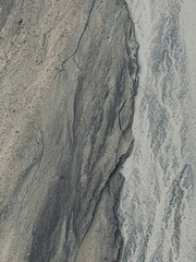 Sand texture close up image grey beige sand 