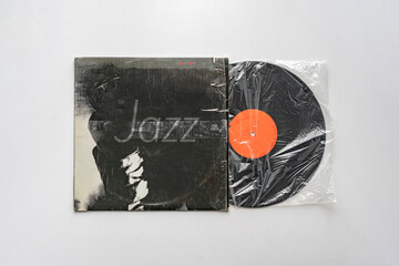 jazz music on the old retro vinyl disc lp record, audio vintage album - obrazy, fototapety, plakaty