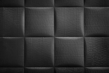 Dark background with squares. Black leather texture background. 