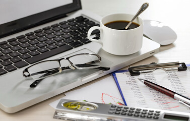 Items for doing business and accounting in the office on the table