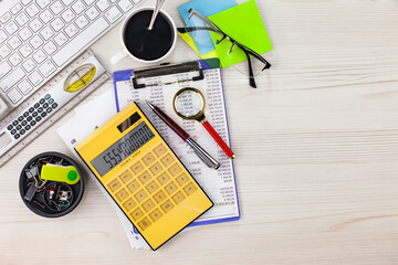 Items for doing business and accounting in the office on the table