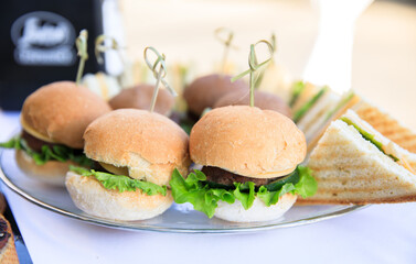 homemade burgers on the plate.