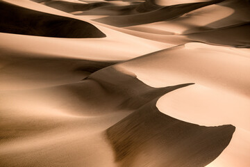 Patterns and waves of Sand Dunes with ripples seen from Death Valley National Park, California  - obrazy, fototapety, plakaty