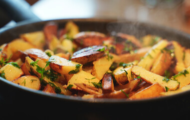 Fried village potatoes with herbs.