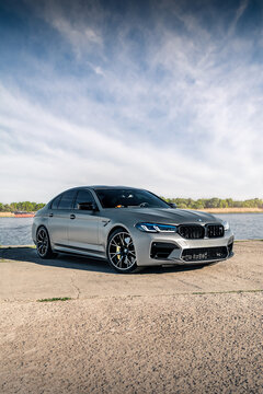 New BMW M5 F90 Competition on the background of the river. Kherson, Ukraine - May 2021.