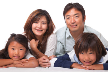Fototapeta premium Japanese family smiling at the camera