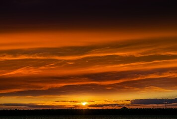 Fototapeta na wymiar fiery sunset, summer nights. background of clouds