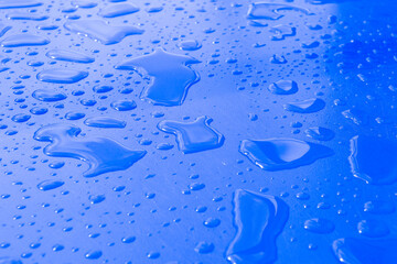 water on a blue surface