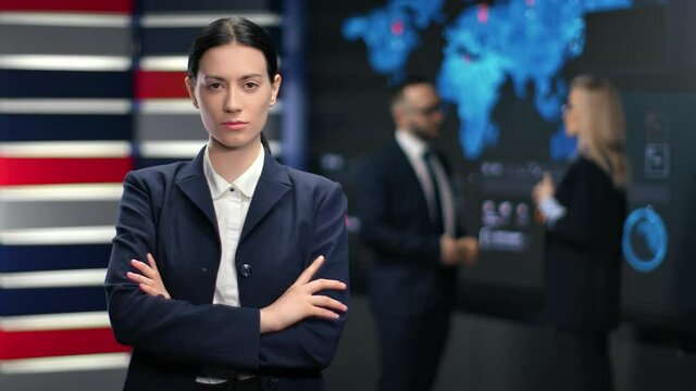 Portrait of successful mixed race brunette woman in suit white collar posing at hi tech office