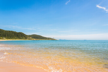 Fototapeta na wymiar Tropical beach landscape. Bombinhas beach in Santa Catarina state.