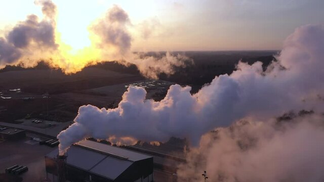 Estonia-November 25. 2019 The thick white smoke coming out of the pipes in Imavere Estonia as seen from the aerial view of the factory
