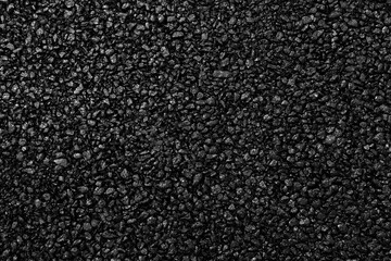 Asphalt pavement with a beautiful black and gray texture  lit by a soft light. Japanese style.