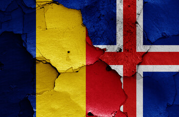 flags of Romania and Iceland painted on cracked wall