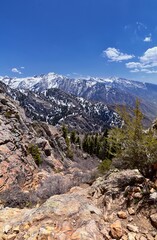 Fototapeta na wymiar Wasatch Front Mount Olympus Peak hiking trail inspiring views in spring via Bonneville Shoreline, Rocky Mountains, Salt Lake City, Utah. United States. USA