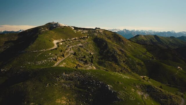 Aerial view of Monte Grappa military shrine ossuary and Dolomite mountain range in background