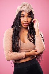 Happy Biracial Woman Posing In Front Of Pink Background