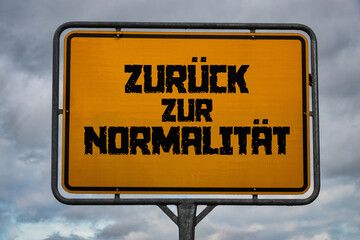 Fototapeta premium Zurück zur Normalität Wegweiser
