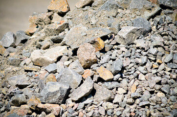 A crushed stone and a sand are materials for making asphalt. Asphalt plant.