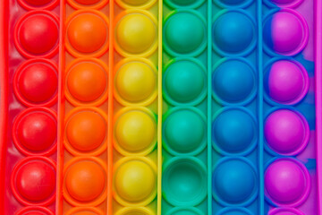 Colorful antistress pop it toy close up.