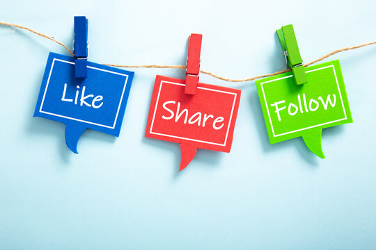 Like share follow bubble with clip hanging on the line. - Powered by Adobe