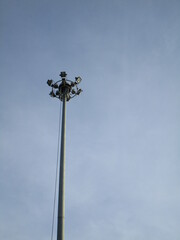 Fototapeta na wymiar Stadium lamp in the sky