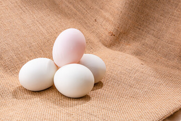 The preservation with salt of the egg menu. Salted duck egg wooden background.
