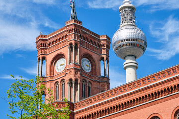 The famous Television Tower and the tower of the city hall in Berlin 