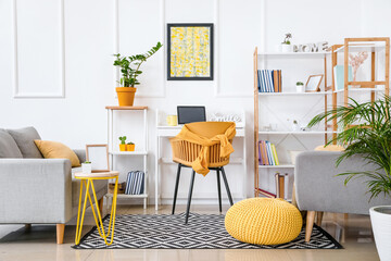 Interior of modern room with shelf units and sofa