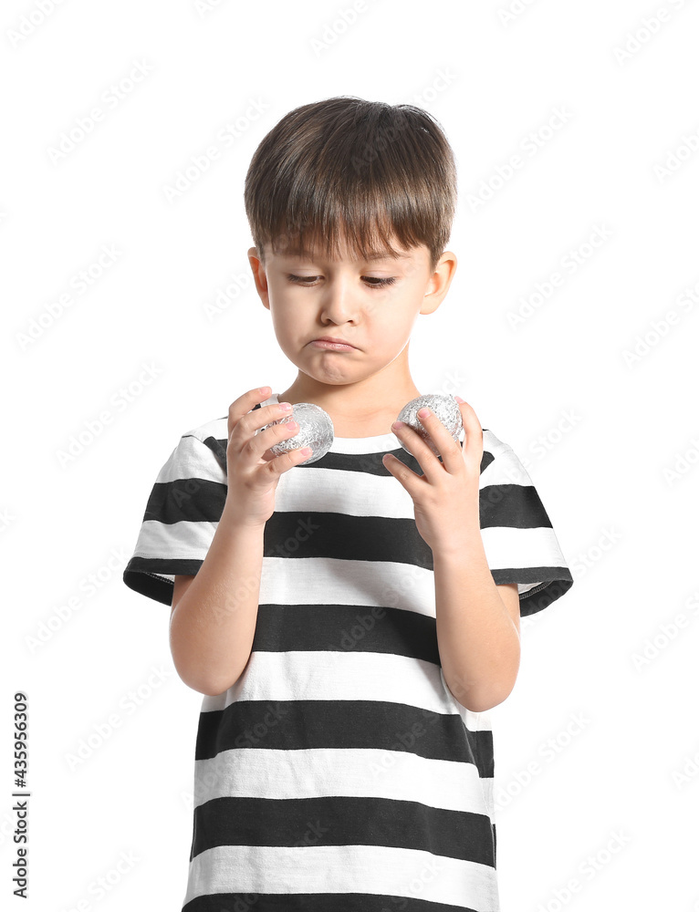 Poster Cute little boy with chocolate Easter eggs on white background