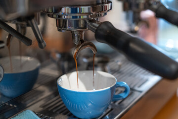 Professional Barista Making Specialty Coffee - Extracting Espresso Shot.