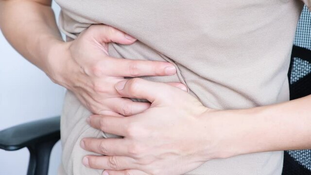 Men have stomach aches from enteritis or enteritis, health and medical concepts.