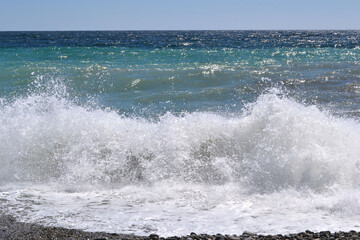 Abstract background. Waves of water of the sea during high tide