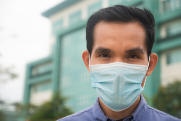 Asian man wear face mask protect covid 19 outdoor urban, Man mask prevent coronavirus outbreak