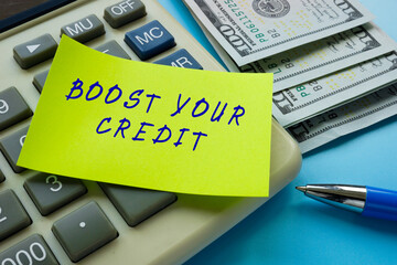 Business concept about BOOST YOUR CREDIT with inscription on the page.