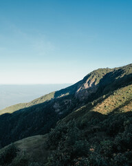 beautiful blue sky high peak mountains green forest guiding for backpacker camping backpacking hiking idea long weekend at Kew Mae Pan Nature Trail Waterfall Doi Inthanon, Chiang Mai, Thailand.