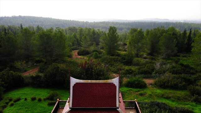 Aerial Shot Thai Pagoda, Drone Flying Forward Over Ben Shemen Forest