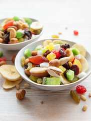 Bowls with various dried fruits and nuts